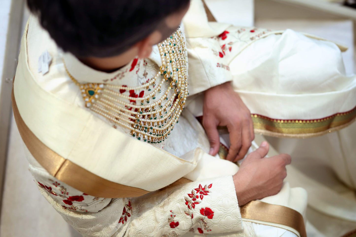 Opulent Ivory Sherwani with Pearl Necklace